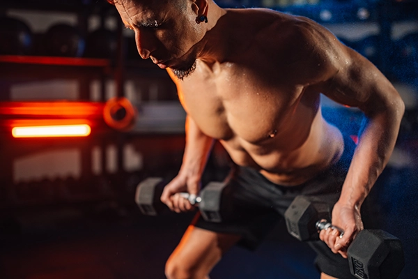 man-doing-exercise-with-light-weights-during-the-t-2026-01-09-09-39-27-utc